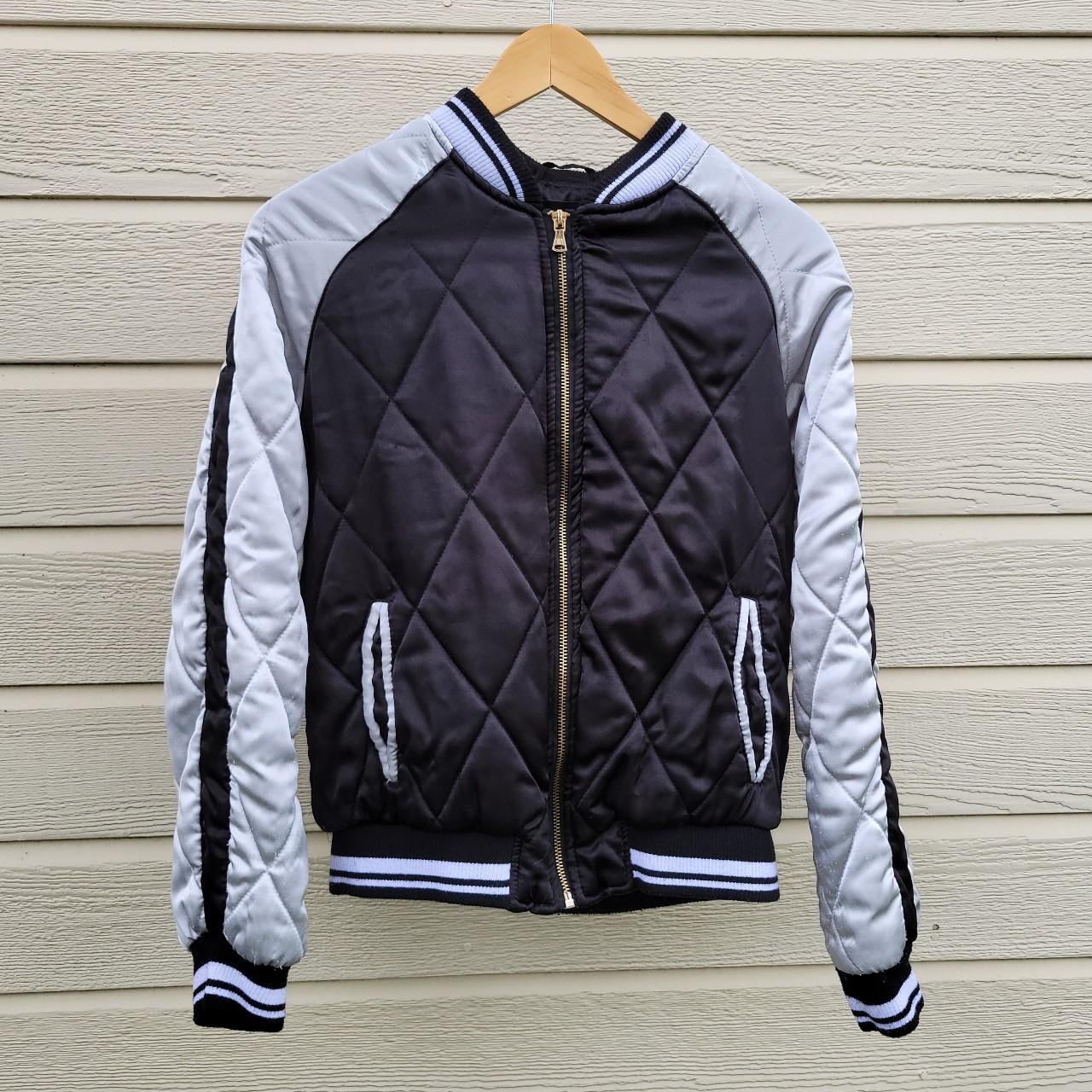 This bomber jacket is straight out of an 80's high... Depop