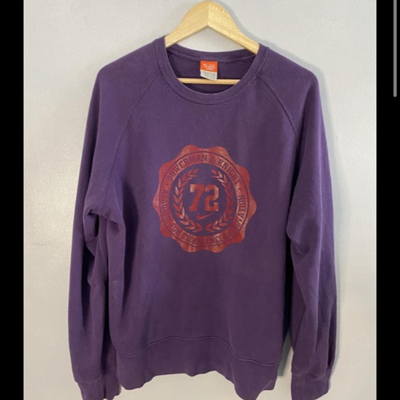 This purple Nike jumper is a vintage item. Has a... - Depop