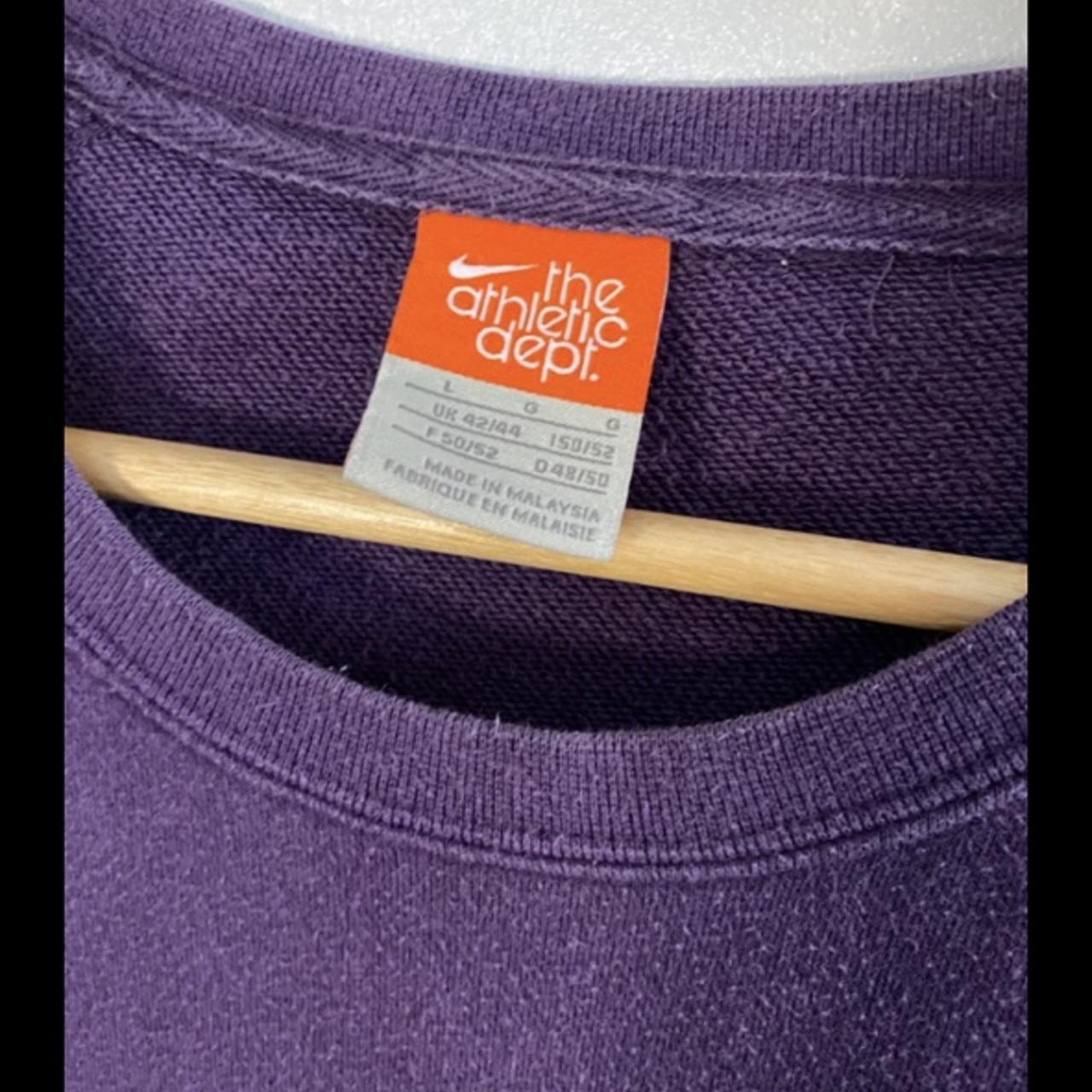 This purple Nike jumper is a vintage item. Has a... - Depop