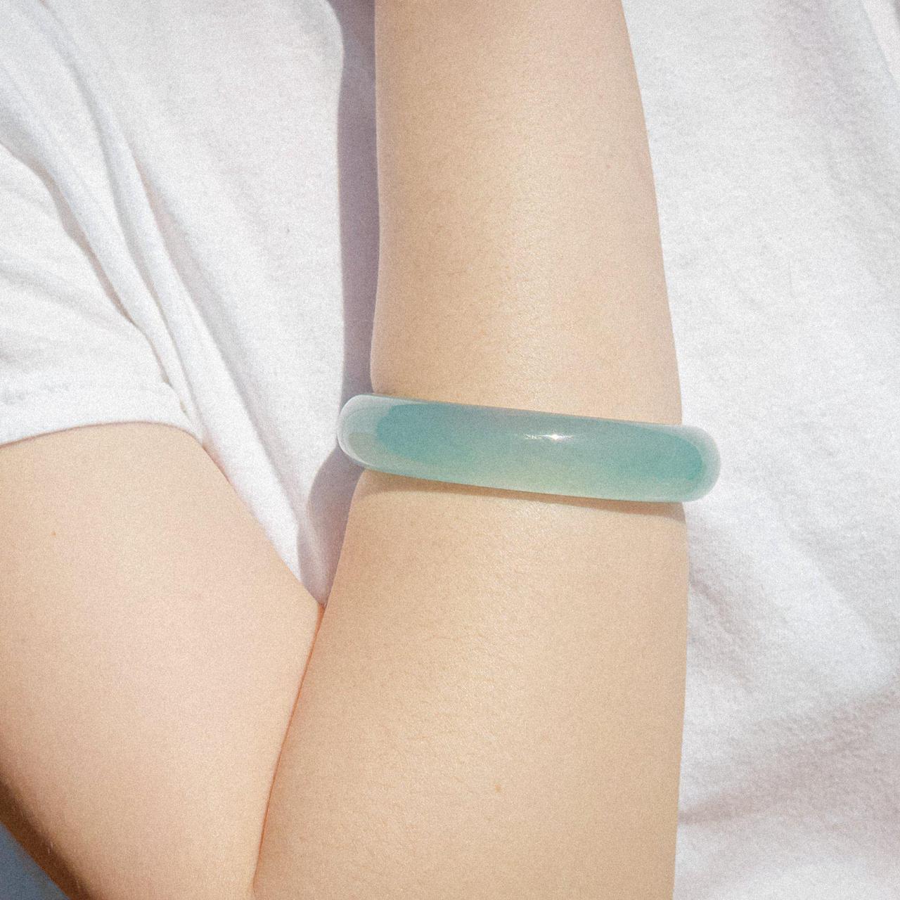 Blue jade bangle. Here's your passport to an - Depop