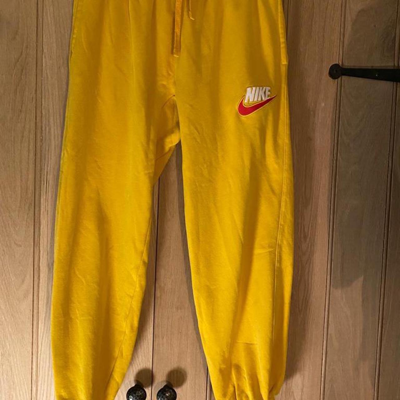 nike yellow tracksuit bottoms