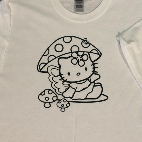 white Hello Kitty design t-shirt with four tiny - Depop