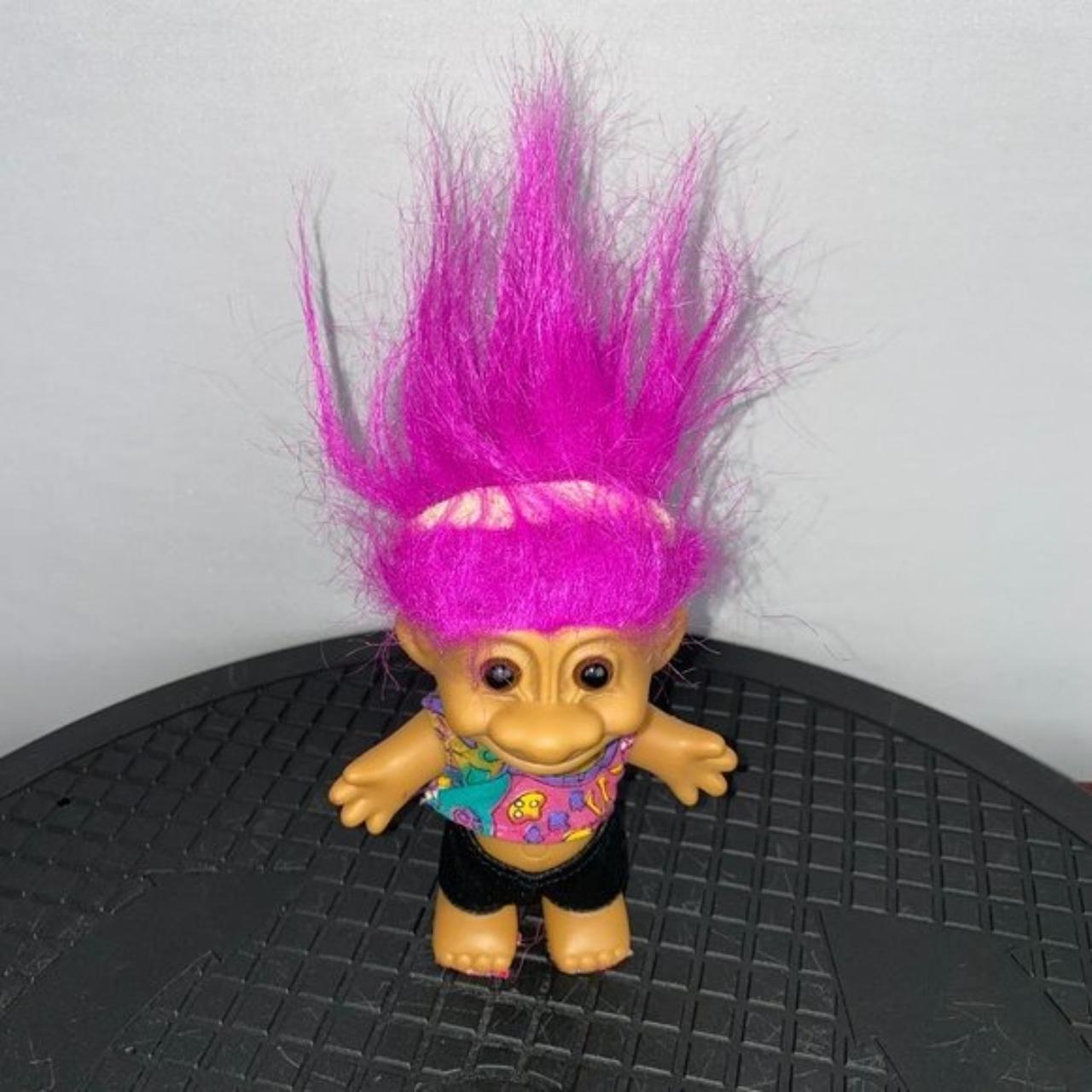 toy story doll with pink hair