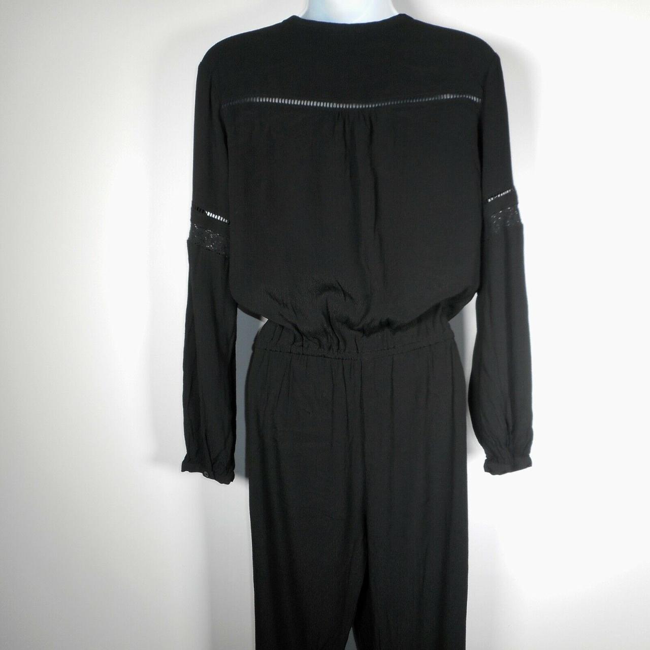 GAP Black Jumpsuit with Long Sleeves Perforated... Depop