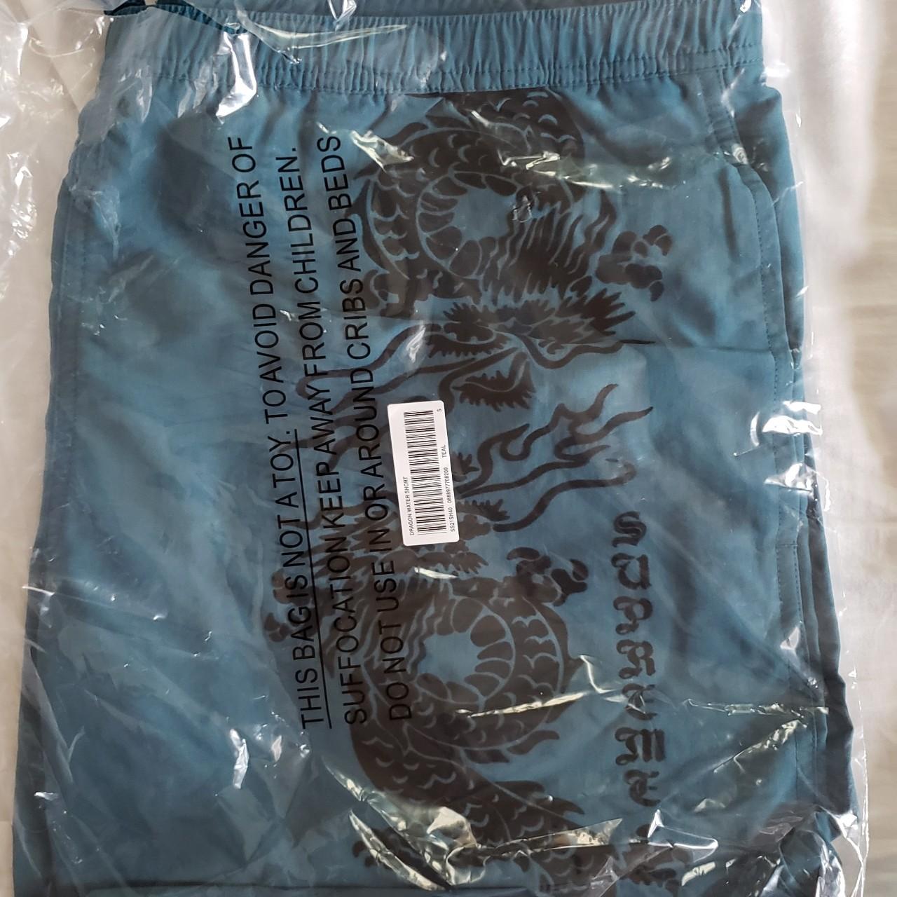 New supreme water shorts teal with dragon Size... - Depop