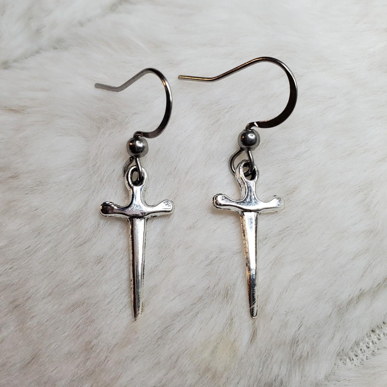 Tiny dagger sword charm earrings. Charms are... - Depop