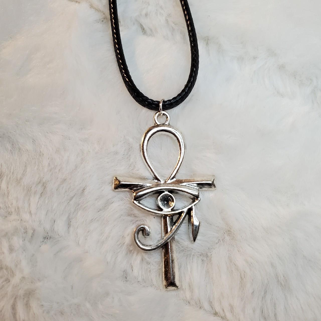 Ankh Eye of Horus charm necklace. Charms are... - Depop