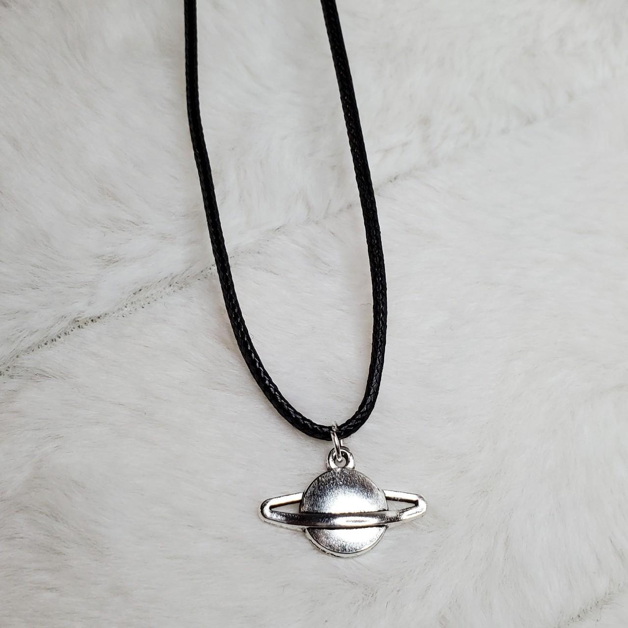 Silver charm necklace Charms are... Depop