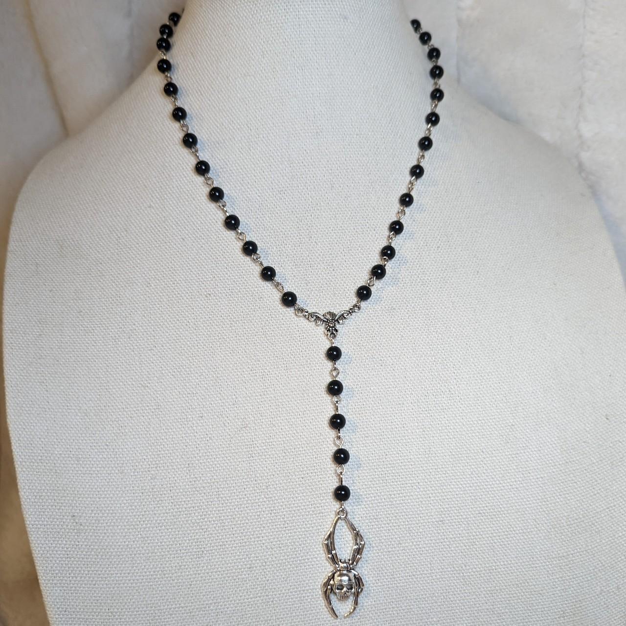 Rosary style spider necklace. Made with black glass... Depop