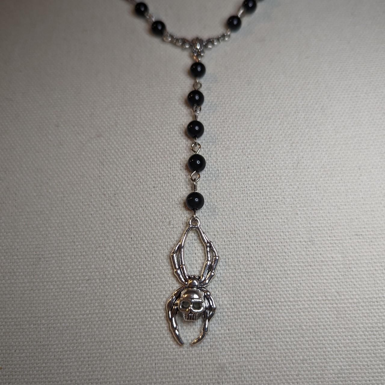 Rosary style spider necklace. Made with black glass... Depop