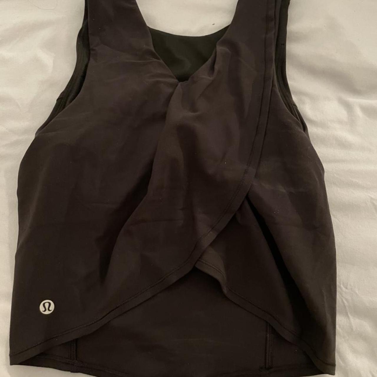 Lululemon Size 2 Nulu Twist Back Yoga Tank in black. - Depop