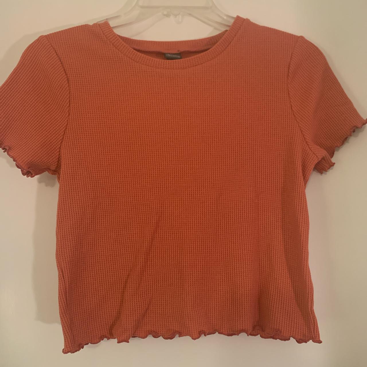 coral crop top with ruffles on the sleeves and on... - Depop