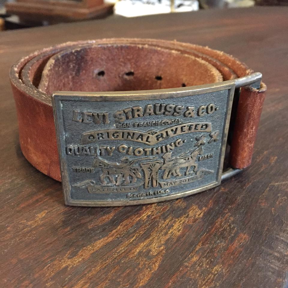 Vintage Levis Belt Buckle with belt. Belt size 34 - Depop