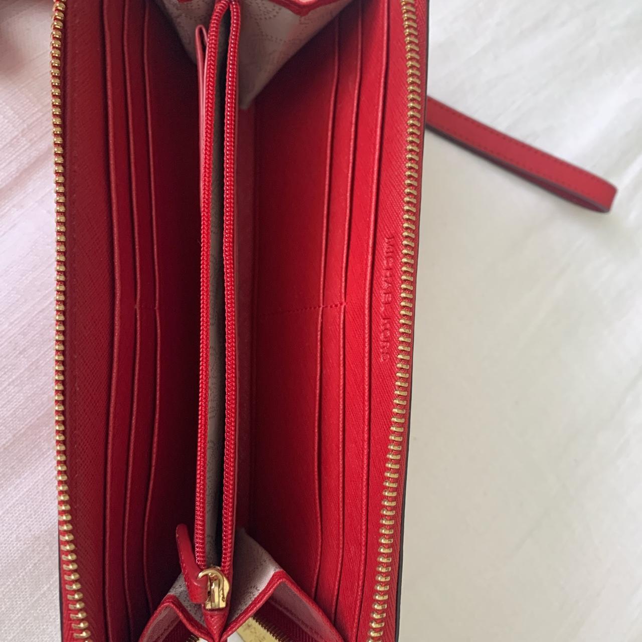 Red micheal kors wallet with wristlet with gold - Depop
