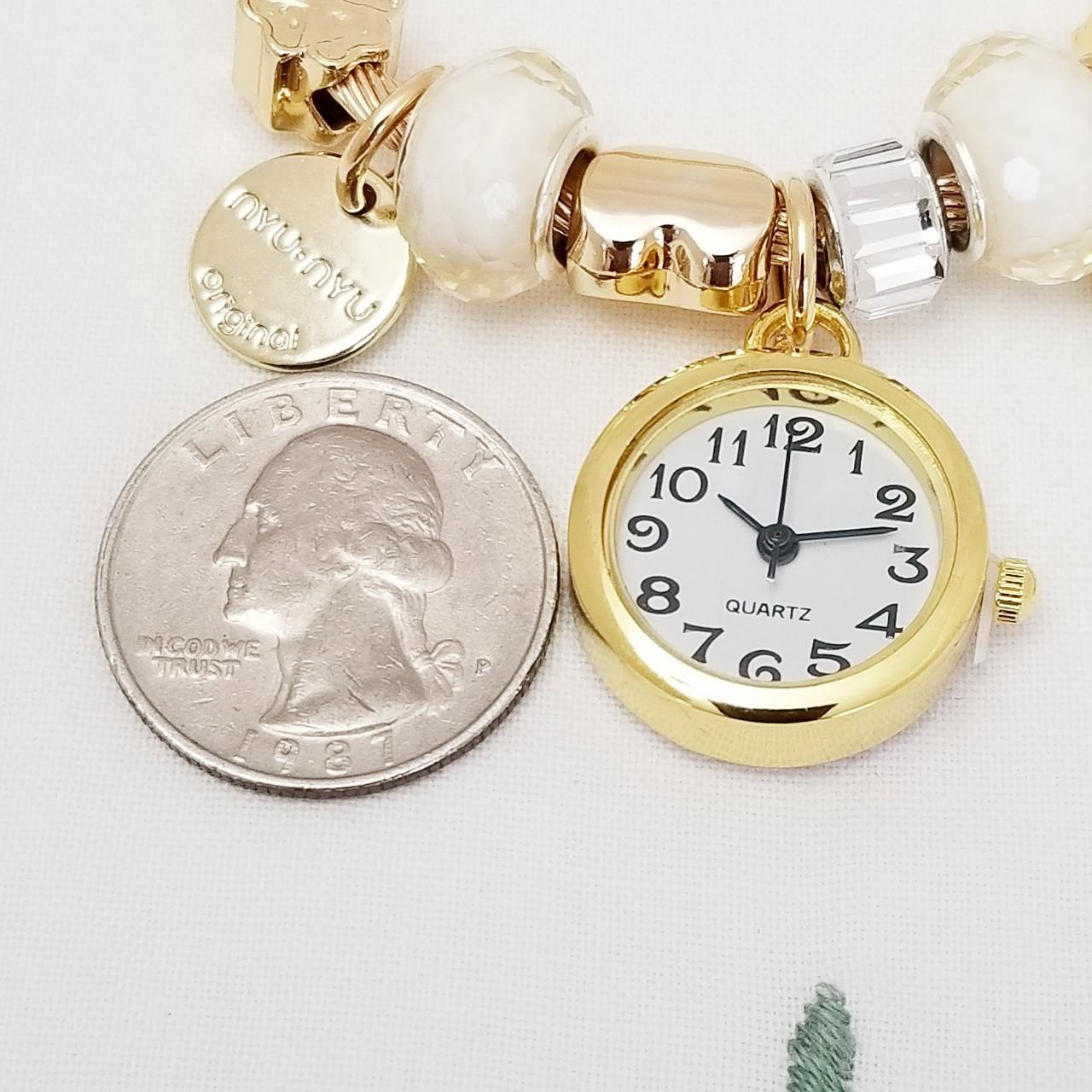 Women's White and Gold Watch (3)