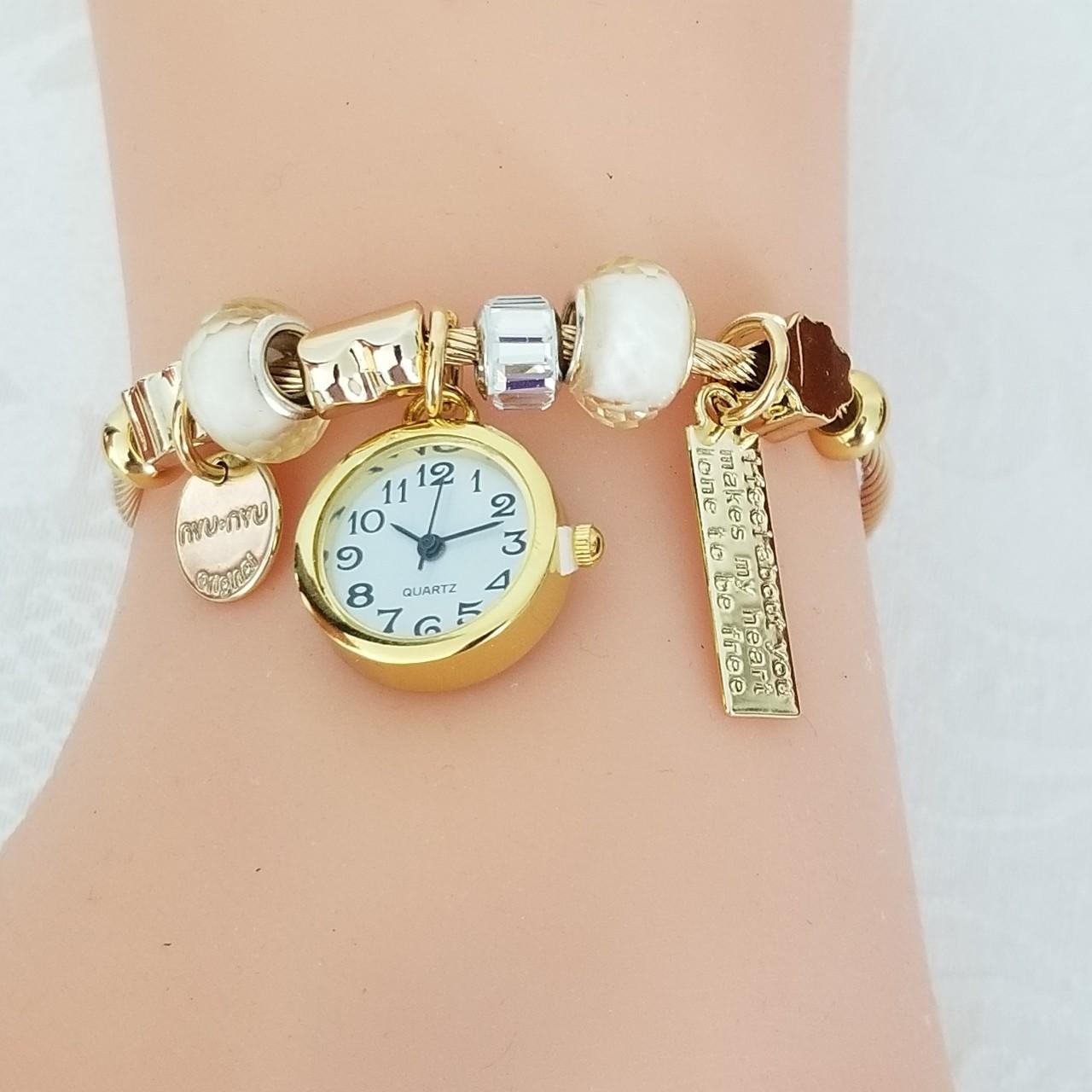 Women's White and Gold Watch