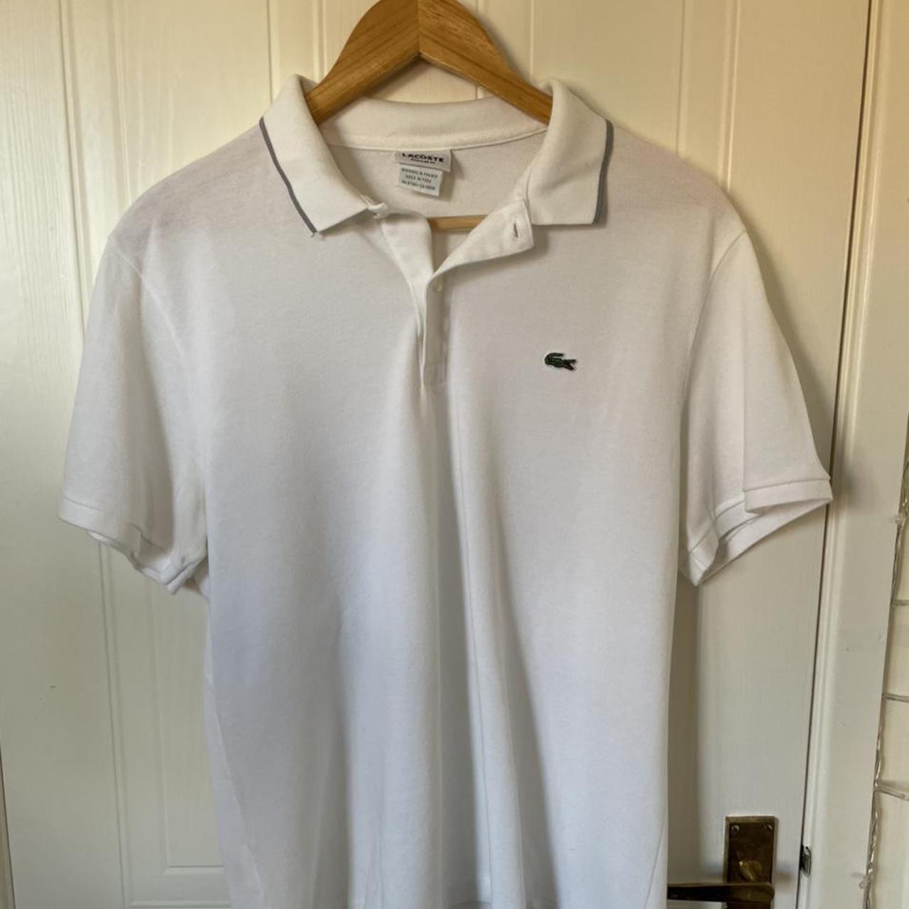 Lacoste men’s white polo shirt with grey trim on the... - Depop