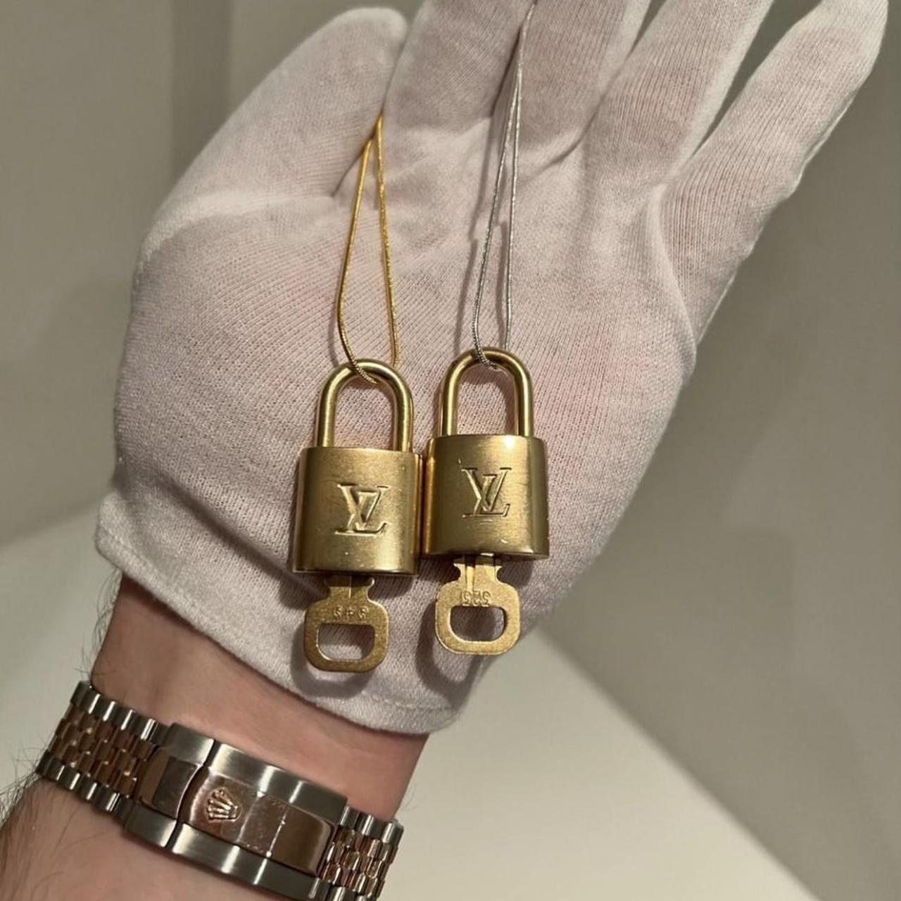 Vintage, authentic Louis Vuitton padlock and key... Depop