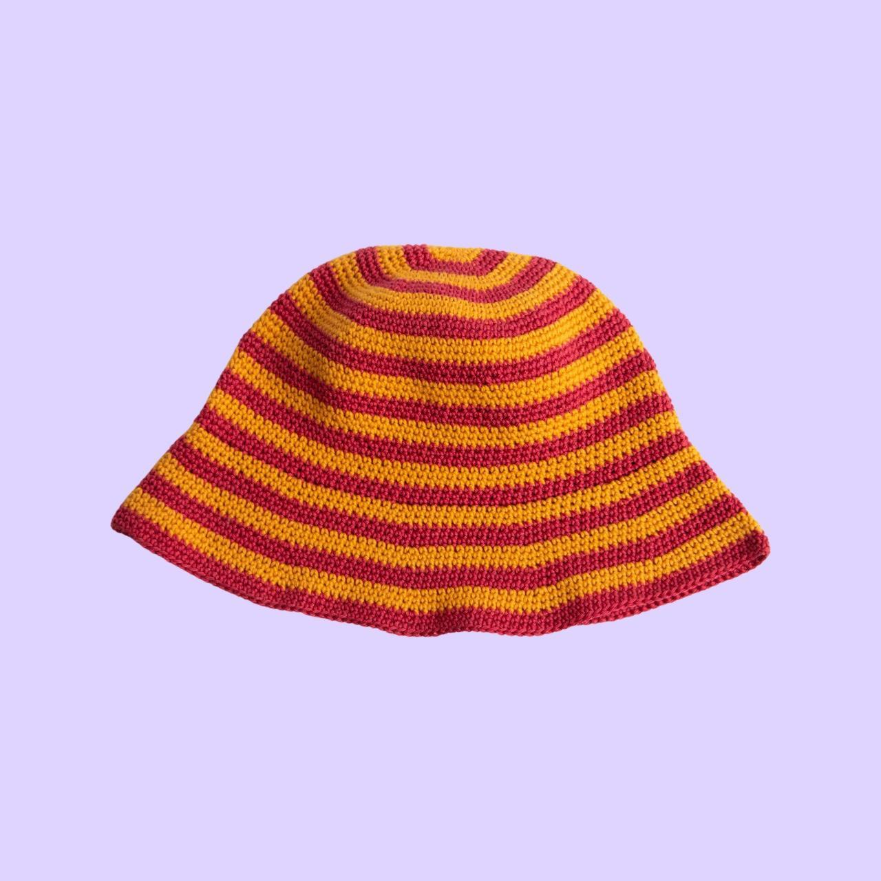 Crochet bucket hat, orange & red stripes. Made with... Depop