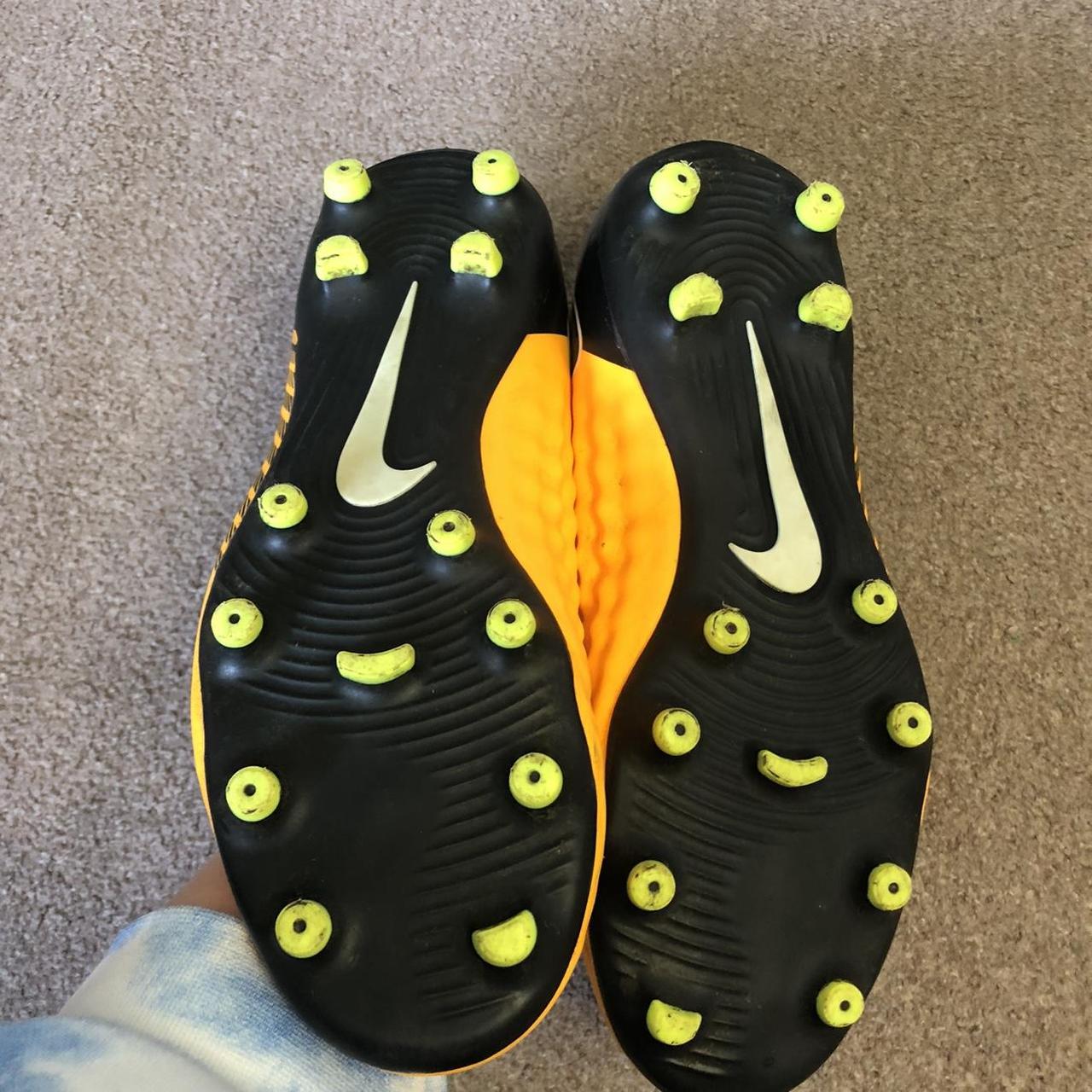 nike yellow and black football boots