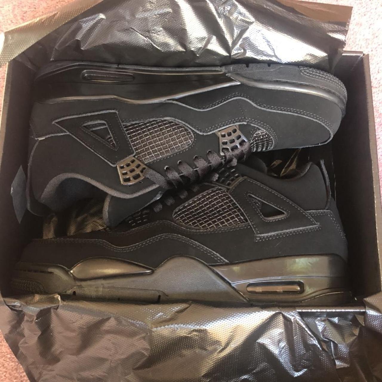 new black cat jordans