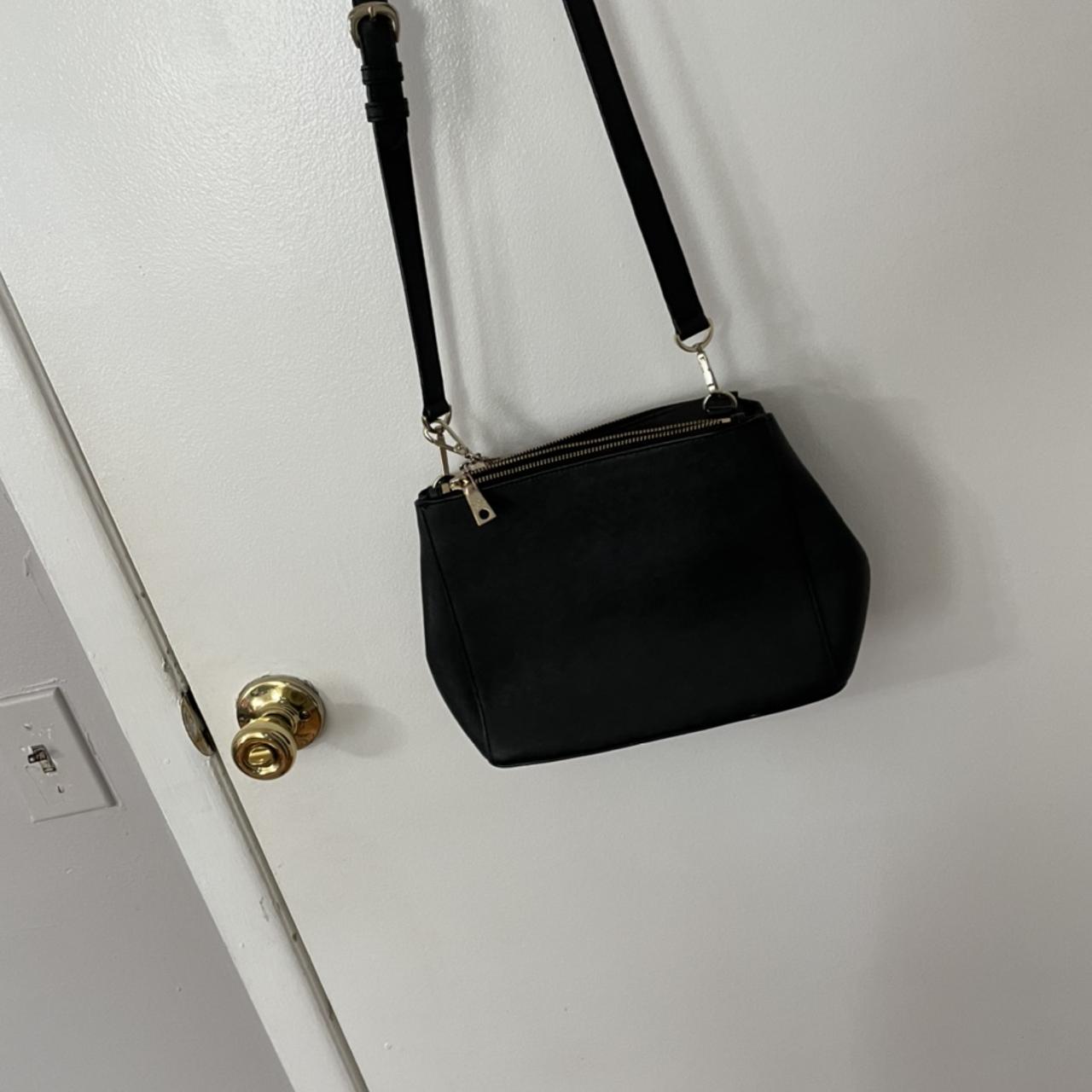 DKNY crossbody black bag. Metal is a little worn.... - Depop