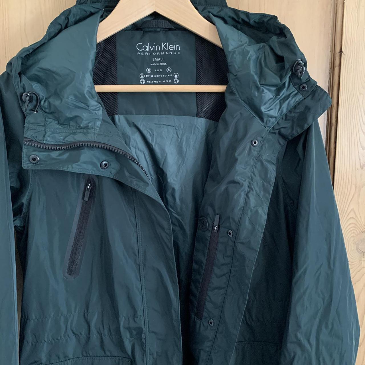 calvin klein performance jacket headphone access