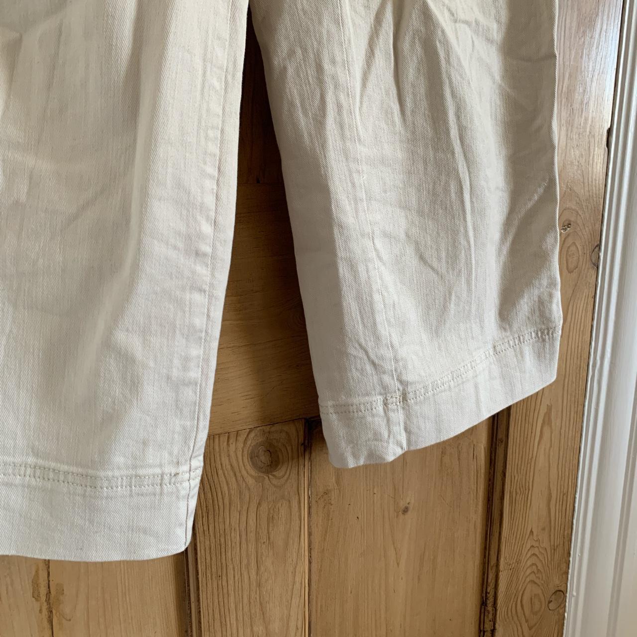 H&M wide leg flared cream jeans. High waisted. Size... Depop