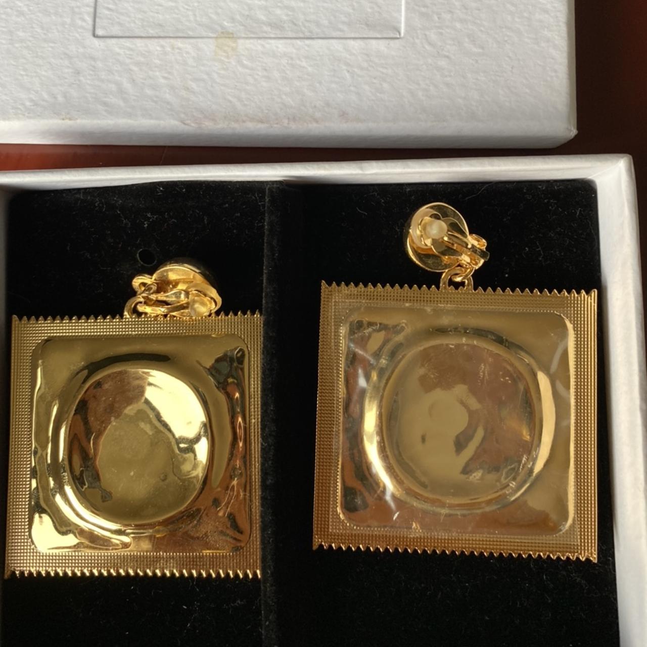 Moschino & H&M clip on earrings. Depop