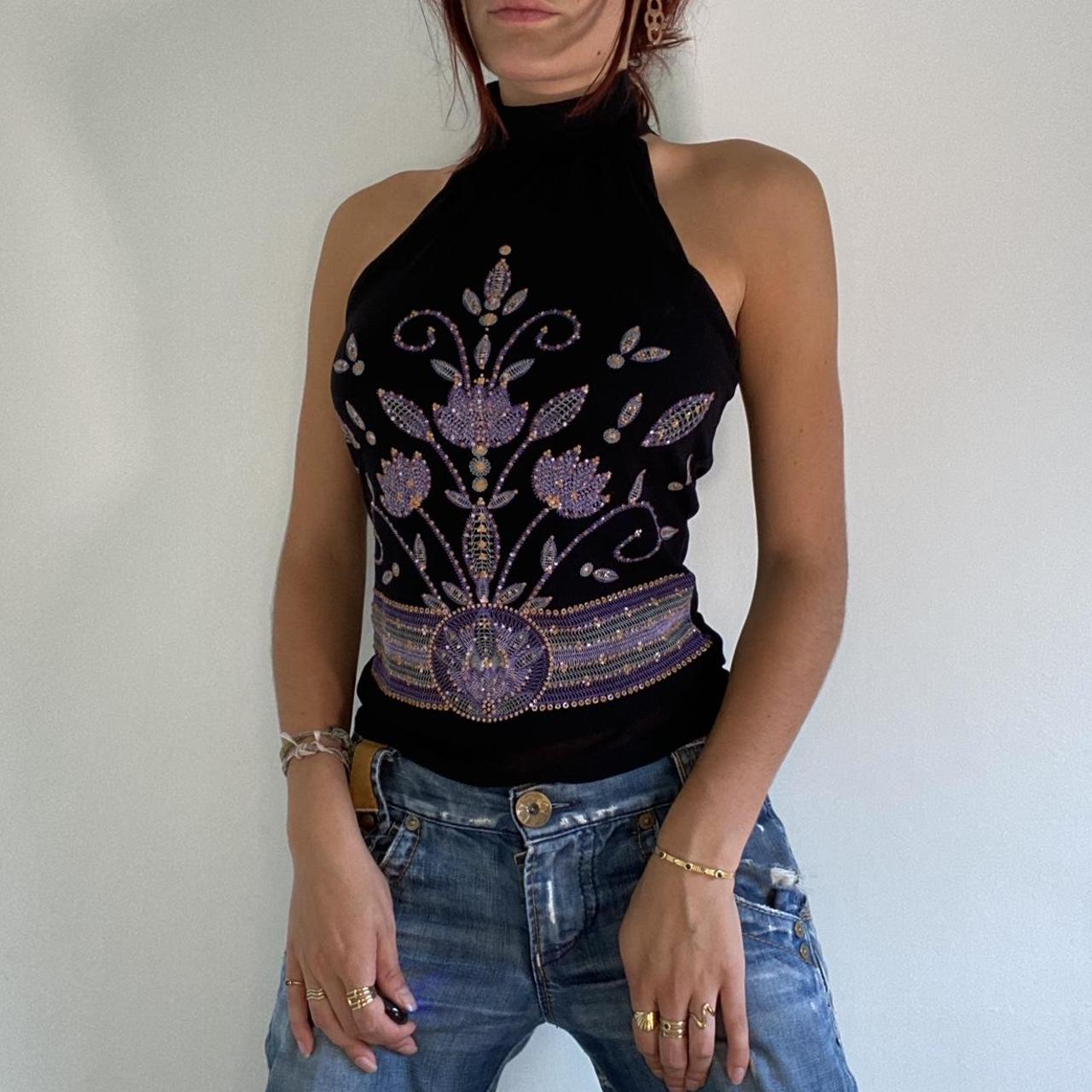 the cutest black high neck top with purple stitched... Depop