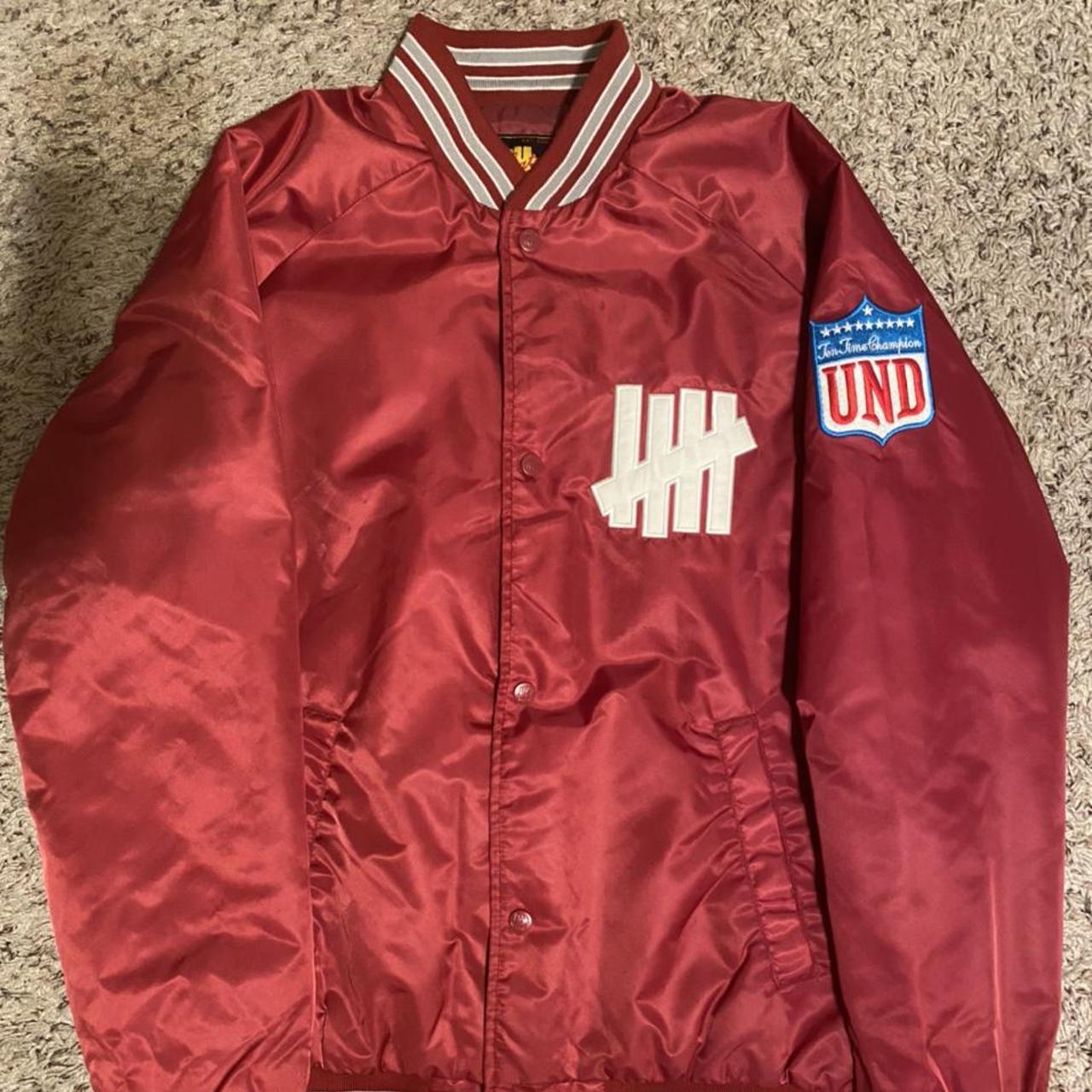 Undefeated red sports jacket. Size M. No flaws,... - Depop