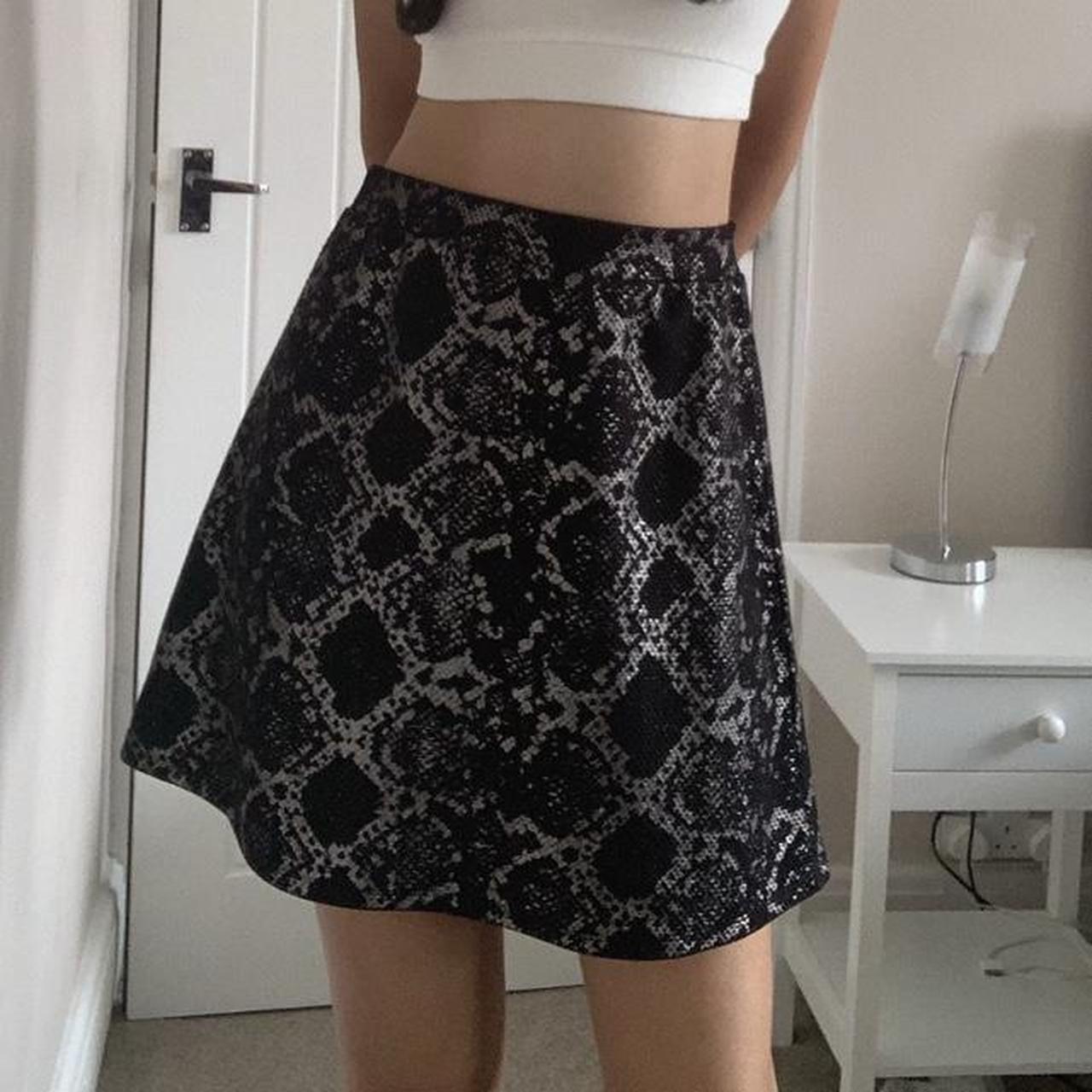 monochrome design mini skirt. worn a couple of times... - Depop