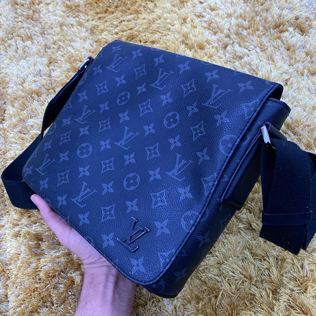Louis Vuitton black messenger bag, in very good... - Depop