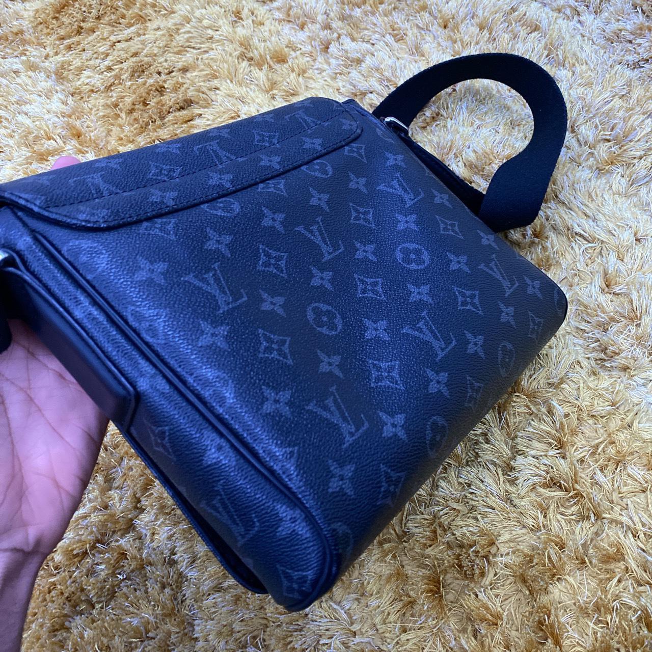 Louis Vuitton black messenger bag, in very good... - Depop