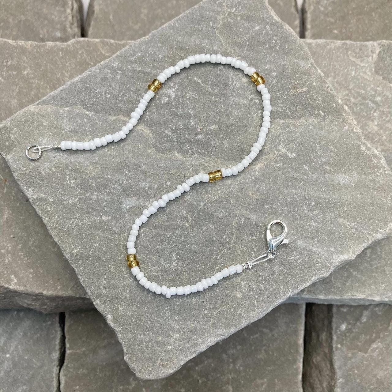 White and gold beaded anklet. This is super cute and... - Depop