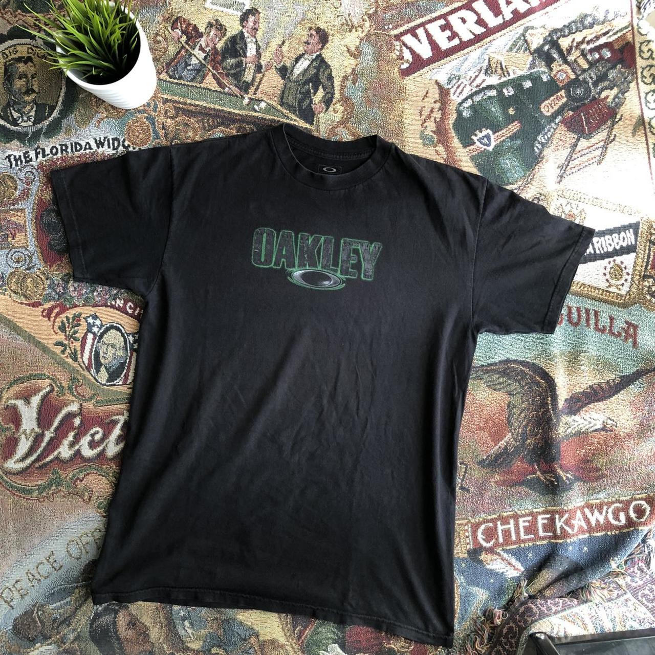 Oakley Men's Green and Black T-shirt | Depop