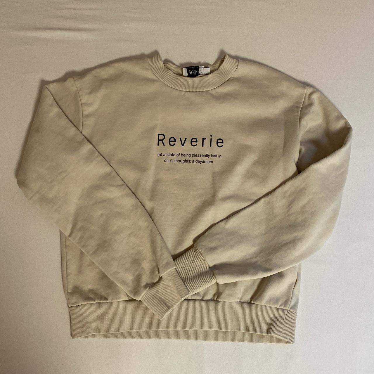 creme sweatshirt with print on the front from NA-KD... - Depop