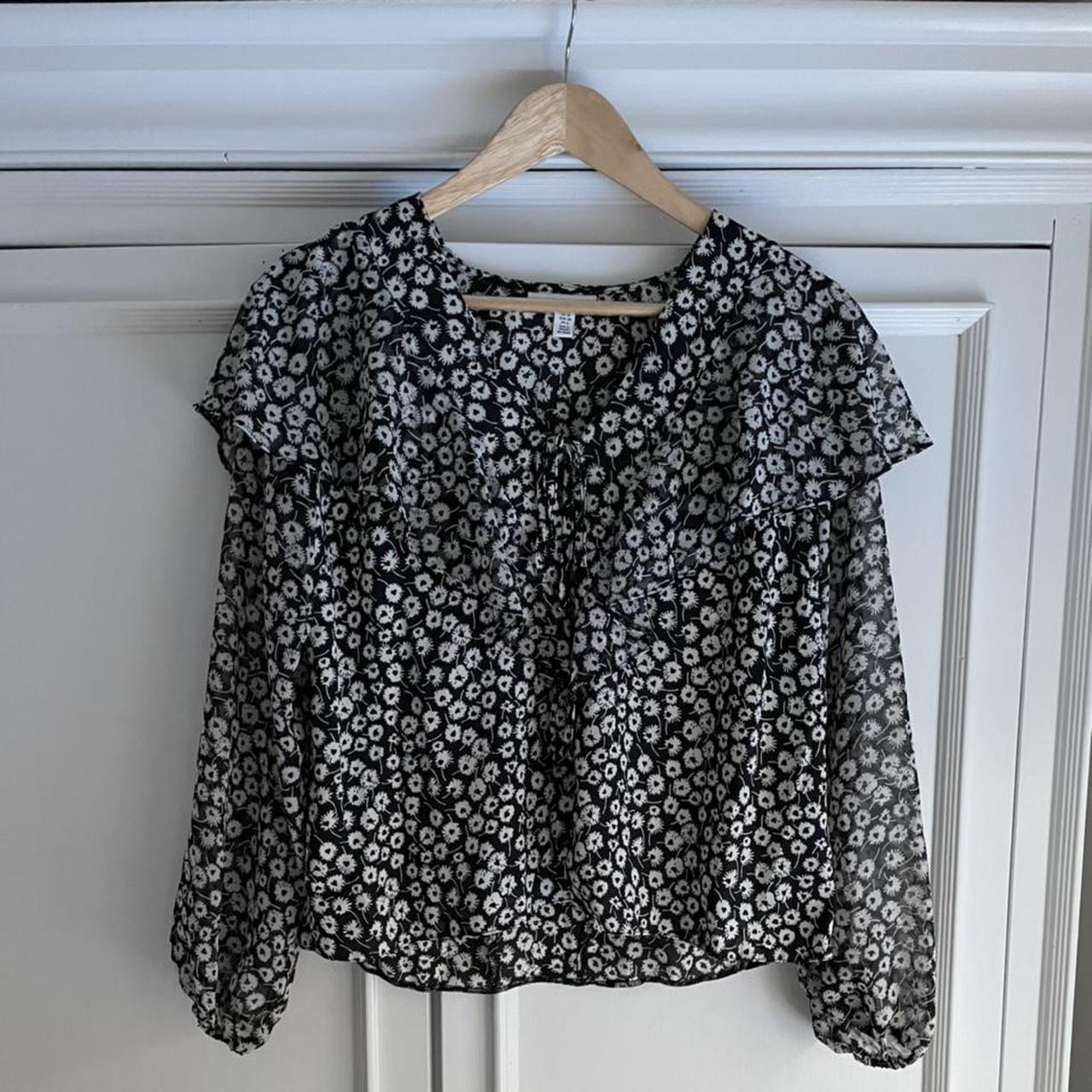 Black and white floral ruffle blouse in a size 10. ... - Depop