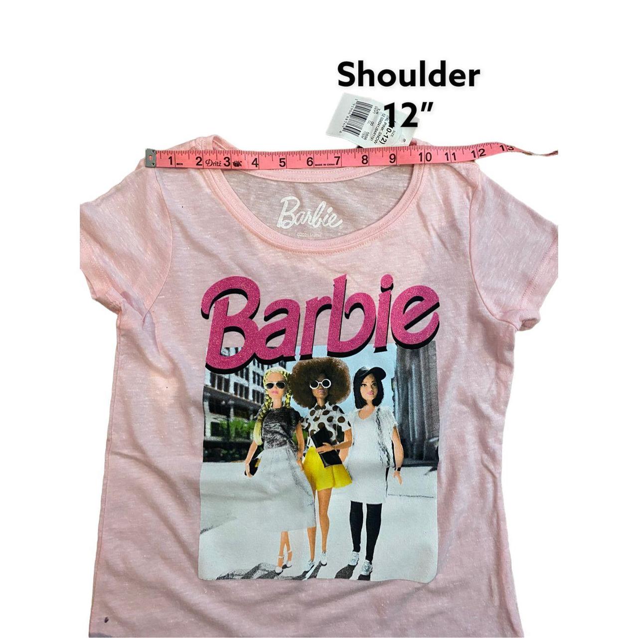 Girls' Pink Barbie graphic tee makes a fun addition... - Depop