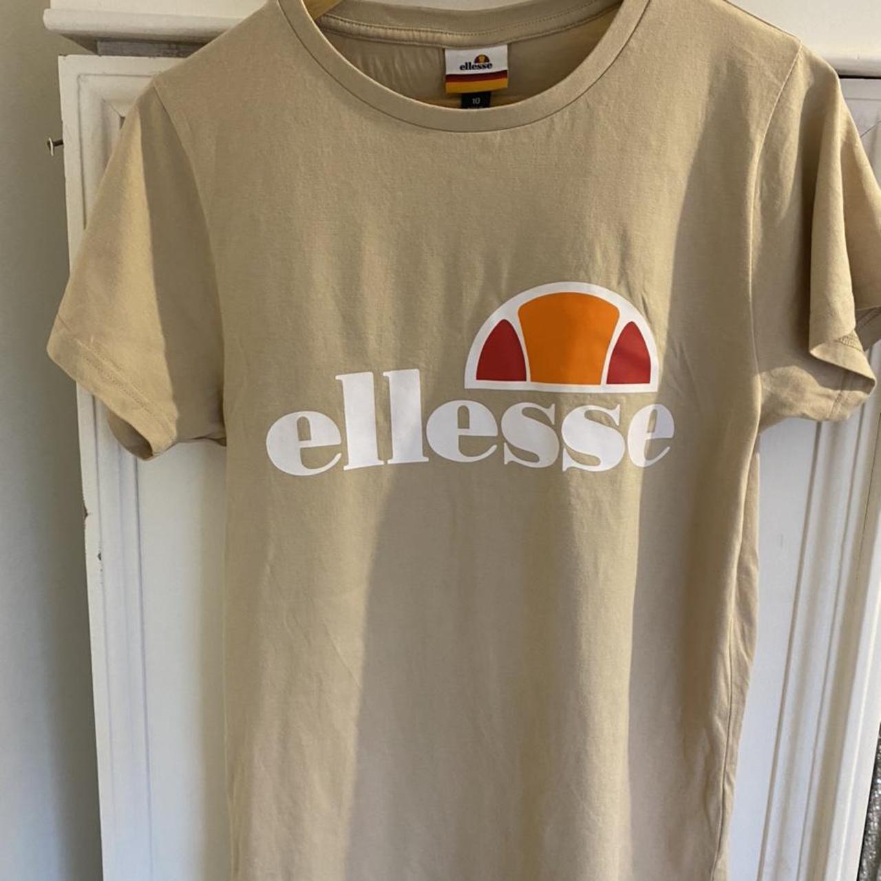 Ellesse nude tan logo t shirt size 10 - Depop