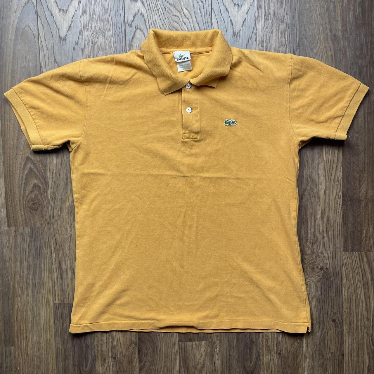 Lacoste Men's Gold Polo-shirts | Depop