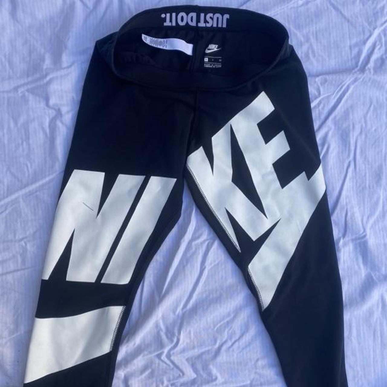 grey and neon green nike shirt