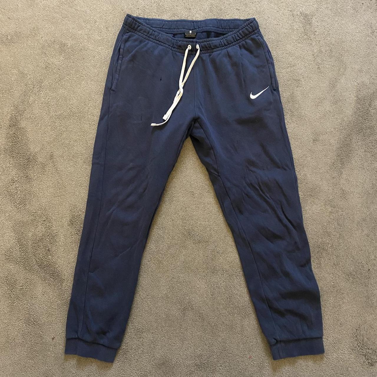 Navy Nike joggers White embroidered logo Two small... Depop