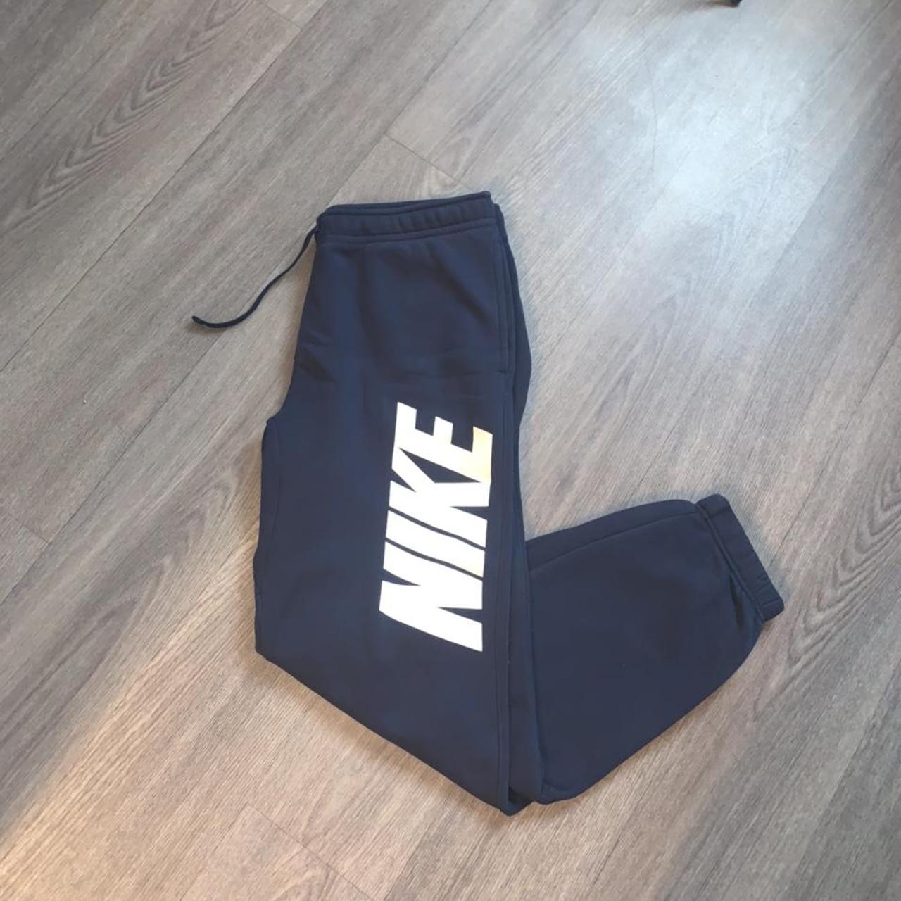 navy nike club joggers