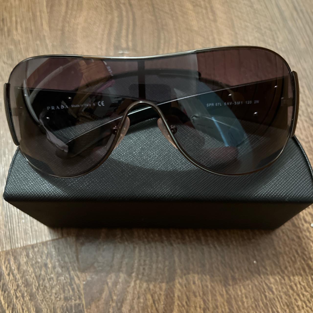 Prada Women's Black Sunglasses | Depop