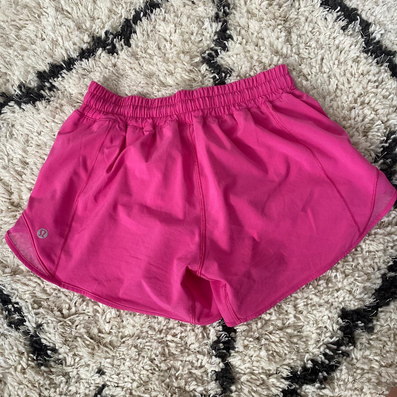 SONIC PINK LULULEMON HOTTY HOT SHORTS size 4 tall/4”... - Depop