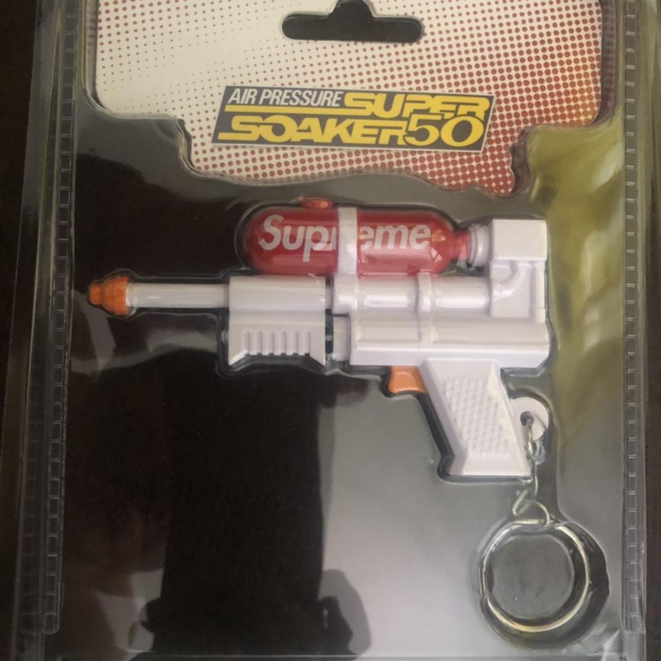 Supreme super soaker 50 water blaster keychain white... - Depop