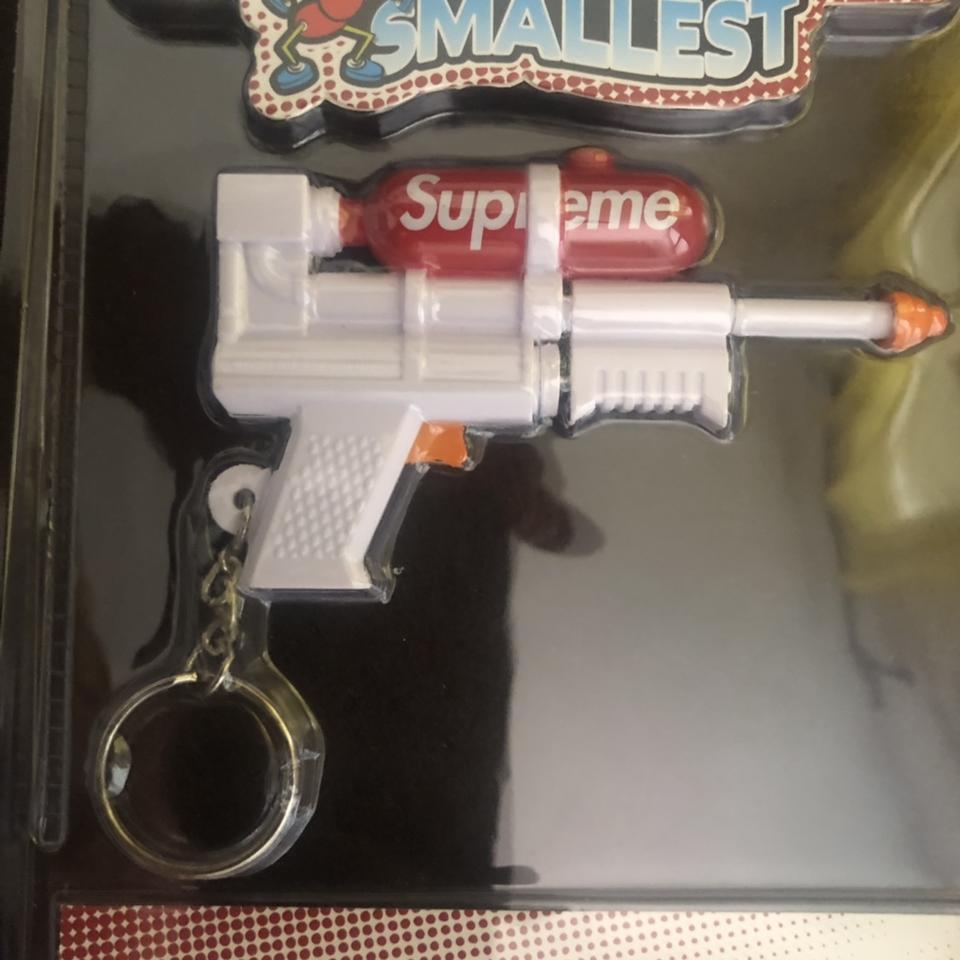 Supreme super soaker 50 water blaster keychain white... - Depop