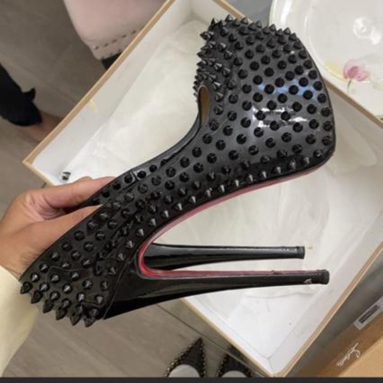 Black louboutin heels with hot sale spikes