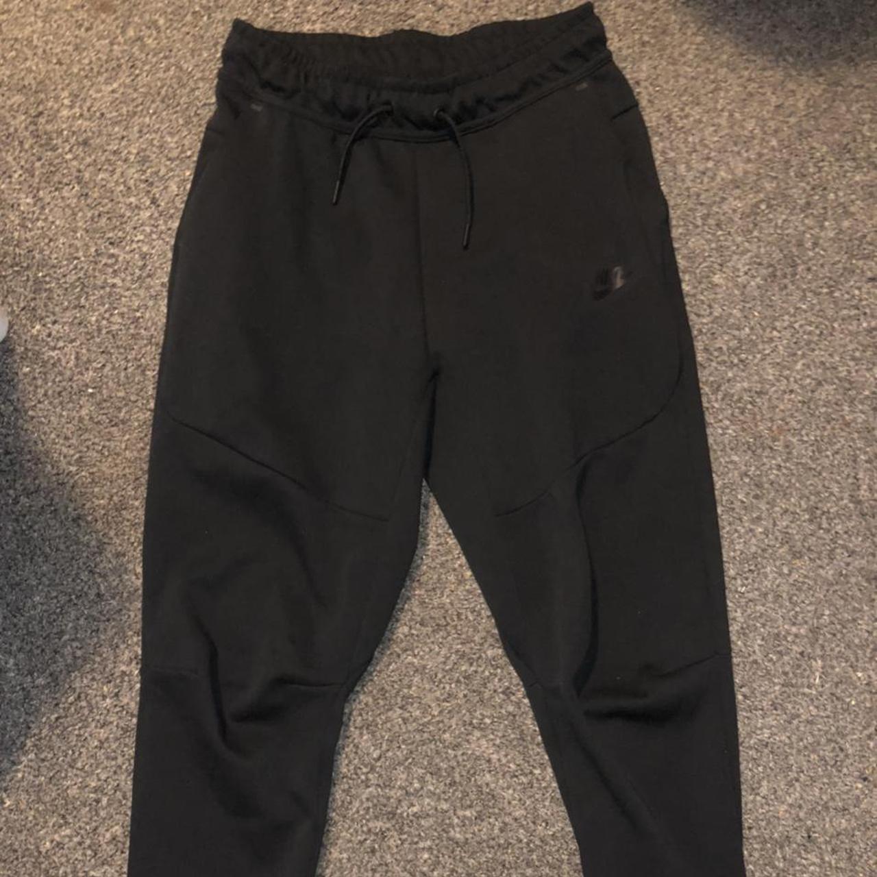 Boys XL New Season Nike Tech black bottoms. Fits... - Depop